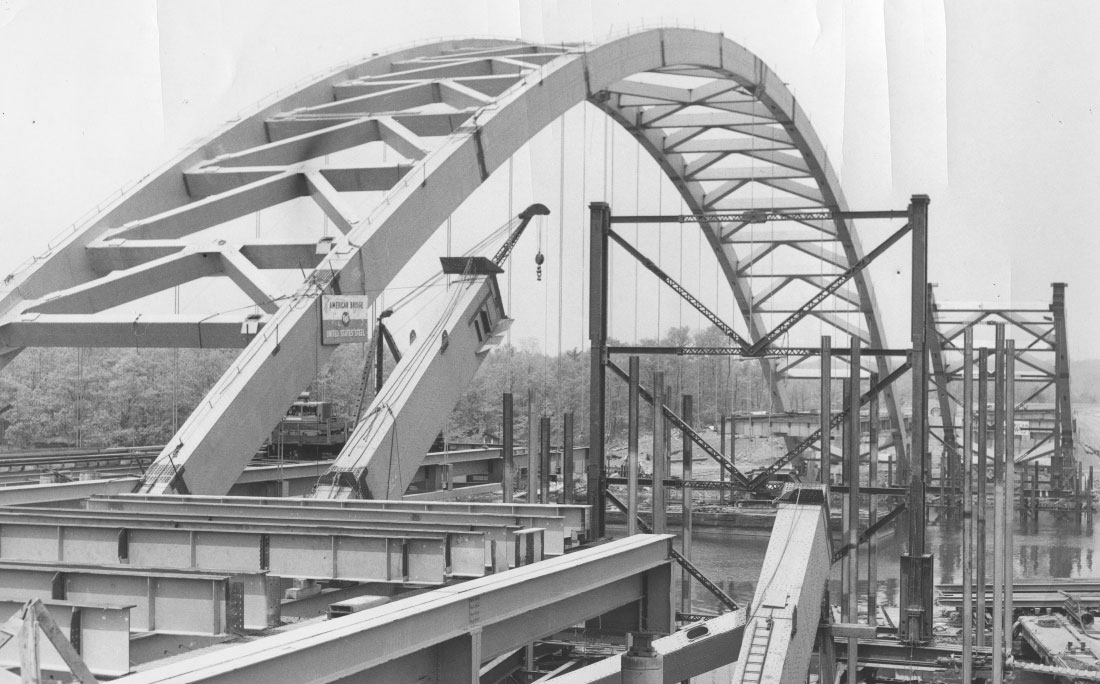 historical image of a bridge being constructed